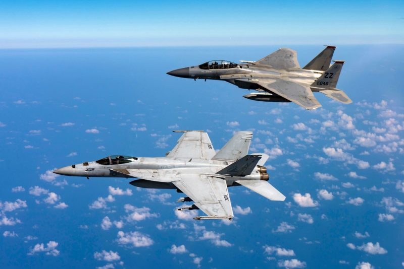 F/A-18E Super Hornet and an F-15D Eagle
