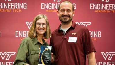 Dean Julie Ross presents Matt Collins with the 2023 Technical Award from the College of Engineering Staff Association.