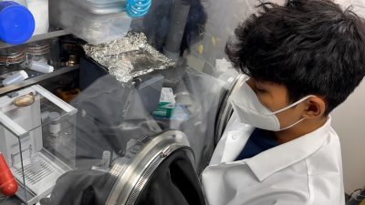 Andika Ardiansah prepares molten salt samples for examination, looking for impurities after purification. Photo by Amanda Leong for Virginia Tech.