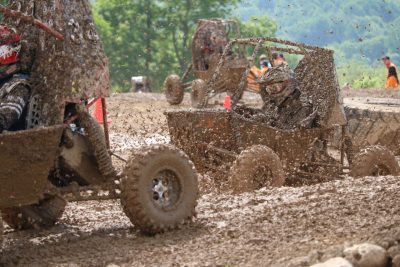 Driver Cole Owenby rises from the mud at a Baja SAE event at Pennsylvania College of Technology, May 2024. Photo by Matthew Orrell.