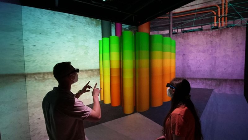 (Left to right) Students Cole Manfred and Emily Meilus inspect a virtual nuclear reactor using the RAPID system. Photo by Alex Parrish for Virginia Tech.