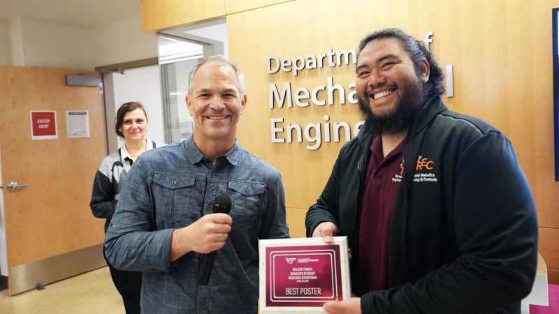 Carlo Canezo (pictured) won a Best Poster award for the presentation, "Ongoing Development of an Upper Body Exoskeleton (EXO) Emulator." Also named in the project was Melanie Hook, and the team was advised by Alex Leonessa. Photo by Alex Parrish for Virginia Tech.